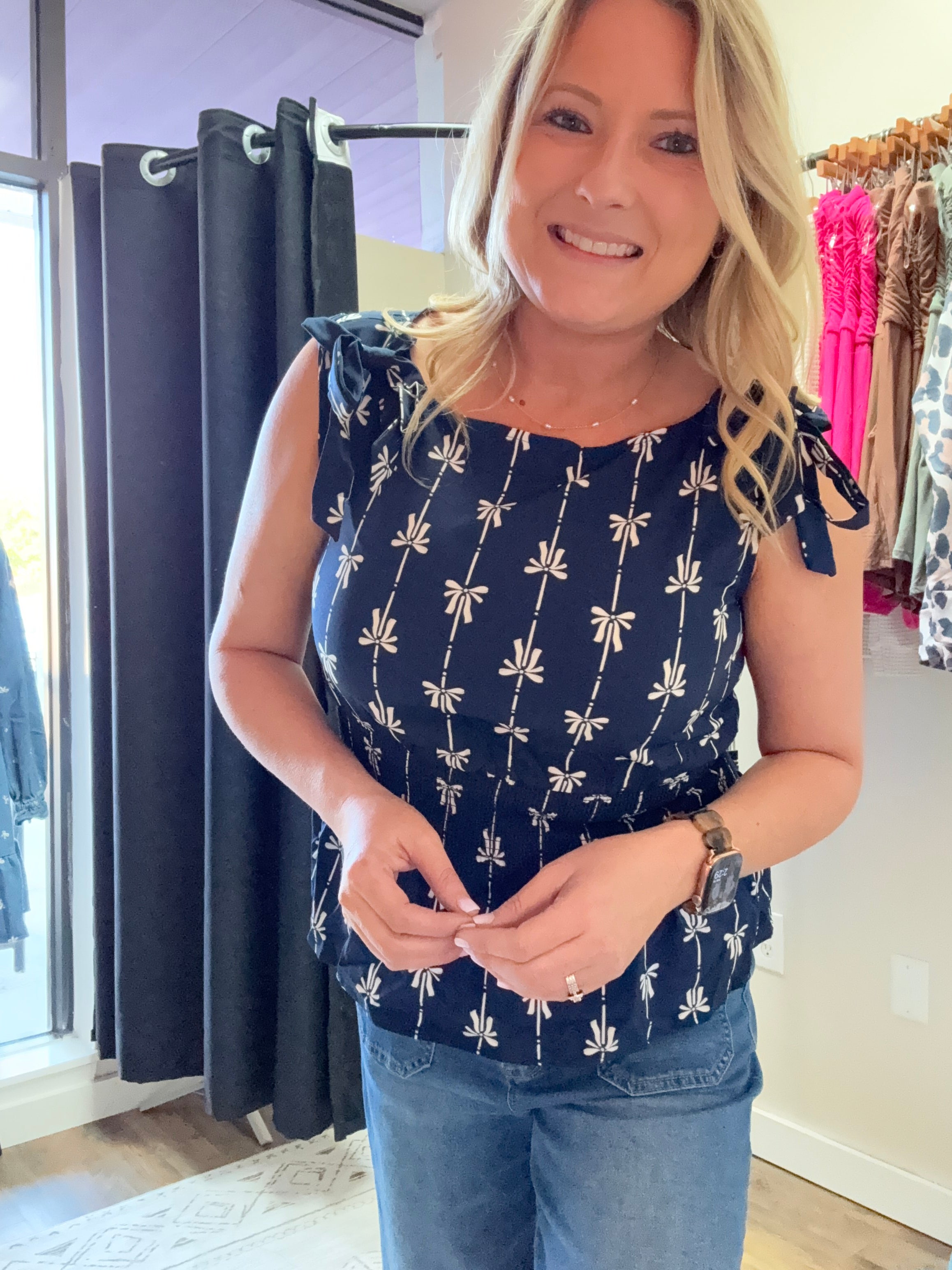 BOW LINE PATTERN TIE SHOULDER SLEEVELESS BLOUSE