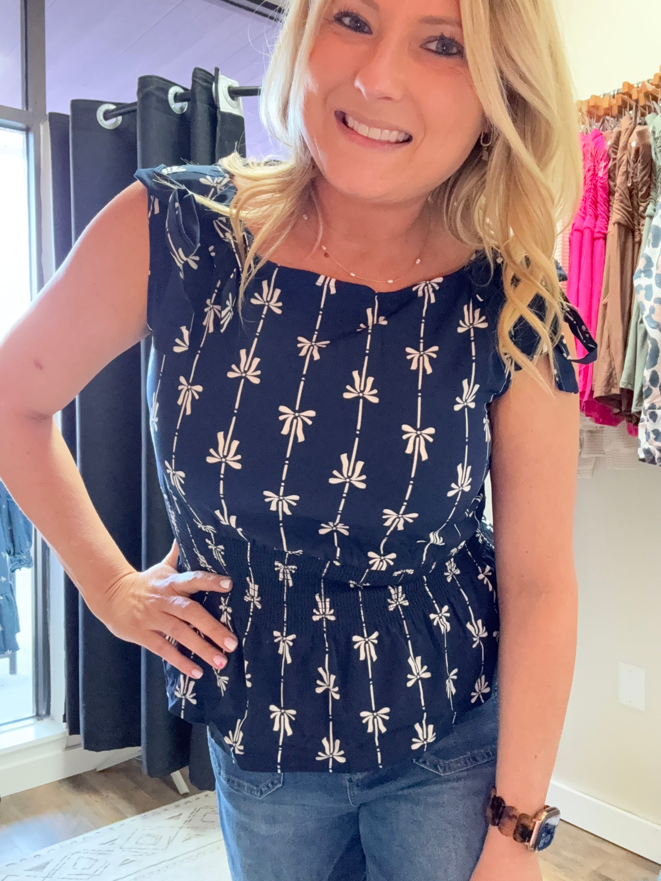 BOW LINE PATTERN TIE SHOULDER SLEEVELESS BLOUSE